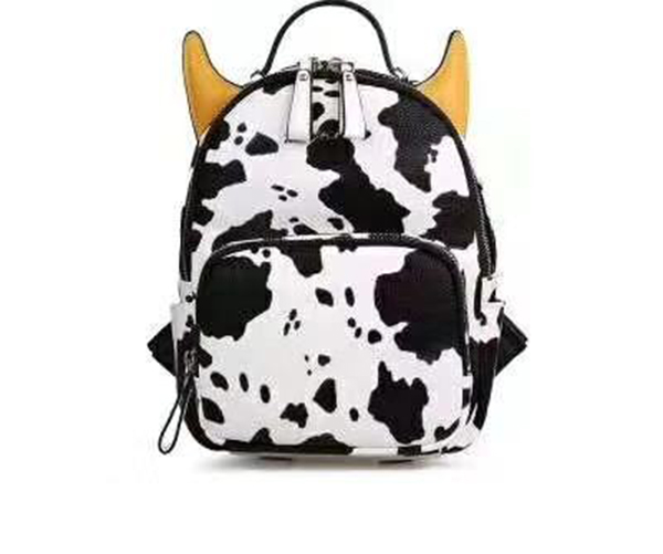 Personality &fashionable cow pattern leather for handbags/shoes/backpack